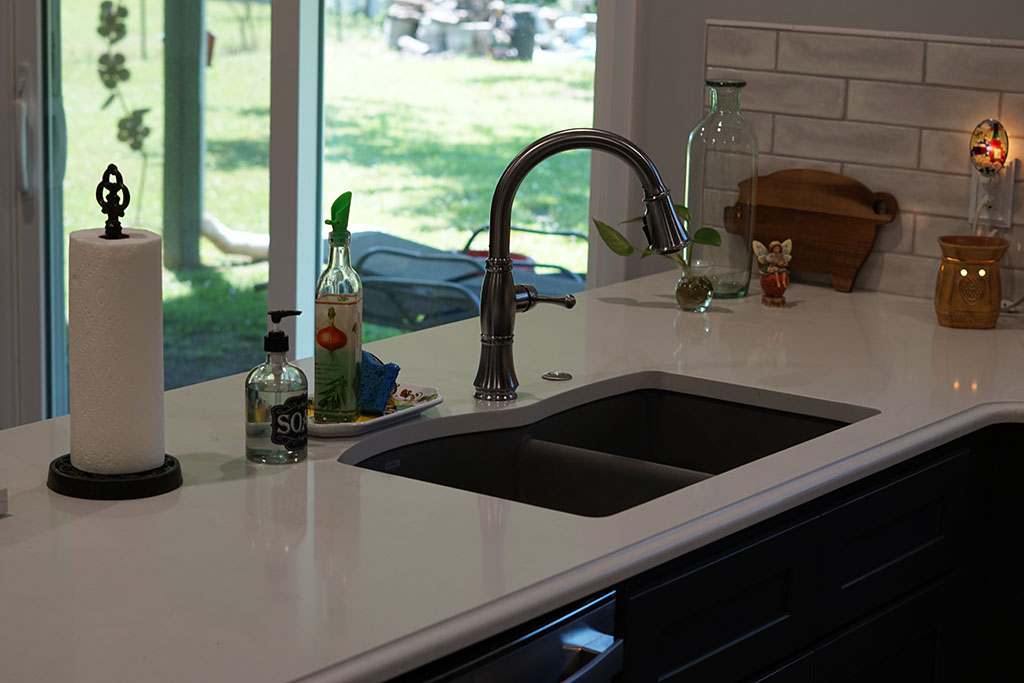 white kitchen counter with built in sink